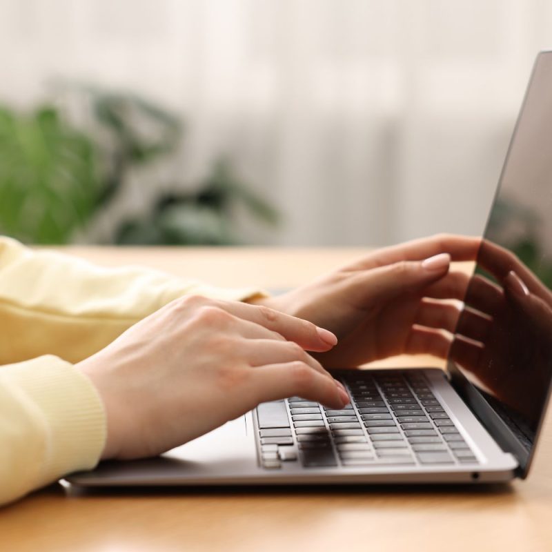 SEO copywriter using laptop